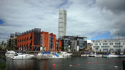 Time Lapse of Malmo Skyline Crowd of People Walk City Port Commuters Commuting Stock Footage 95979640