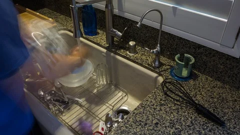 Time Lapse of Man Cleaning the Dishes Stock Footage 109673770