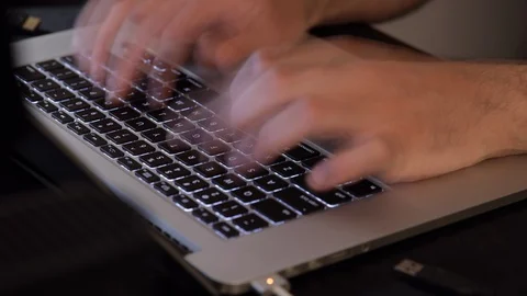 Time lapse Man Hands Typing On Laptop Computer Keyboard Stock Footage 129231965
