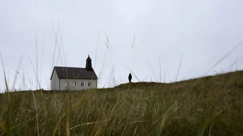 Time-lapse Of A Man Outside The Strandarkirkja Church Video stock 231241267