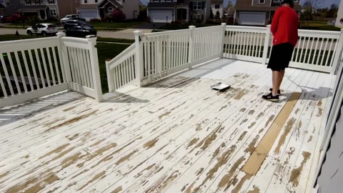 Time lapse of man painting deck. 스톡 동영상 153044471