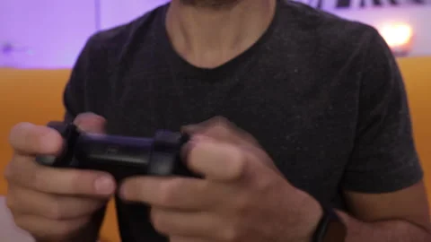 Time lapse: man plays a video game. Recreation and play time Video stock 136355463