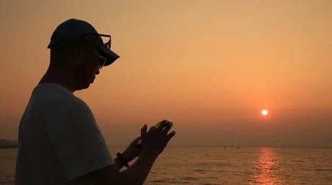 Time lapse of Man standing and using smart phone Stock Footage 54316476