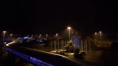 Time Lapse of Manchester Airport Terminal 2 at night, with Skylink Stock Footage