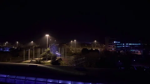Time Lapse of Manchester Airport Terminal 2 at night, with Skylink Stock Footage