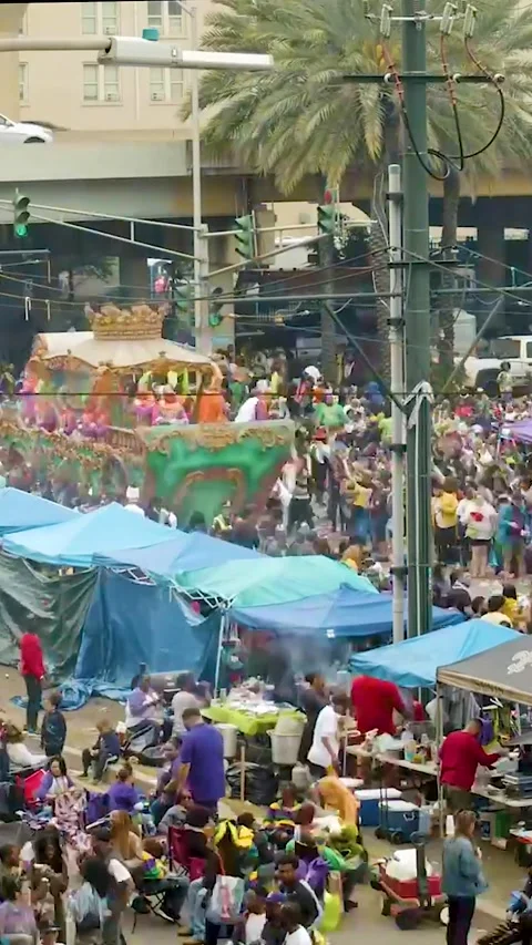 Time-Lapse of Mardi Gras Parades Moving Down St. Charles Avenue Under the Stock Footage 321053976