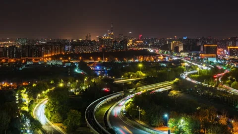 Time-lapse materials of the urban highway at Guomao in Beijing, China at night Stock Footage 296080896
