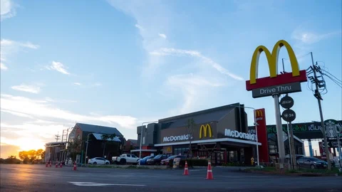 Time lapse of McDonald's at sunset. Stock Footage 129584772
