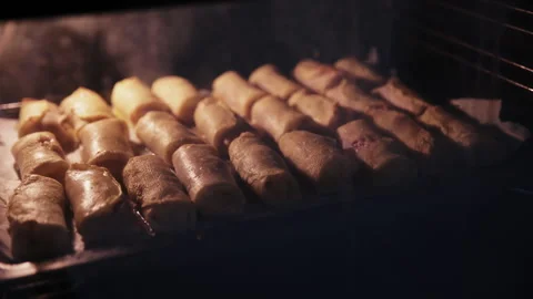 Time-Lapse Meat Crepe Rolls Baking Inside a Hot Oven Stock Footage 332159787