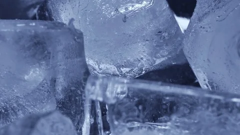 Time lapse of melting group of ice cubes. Close up shot camera Stock Footage 75947098
