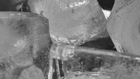 Time lapse of melting group of ice cubes. Close up shot camera Stock Footage 75947099