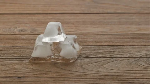 Time Lapse Of Melting Ice Cubes in a hot day. Stock Footage 106005797