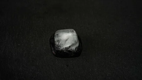 Time lapse of melting ice cubes Stock Footage 130006581
