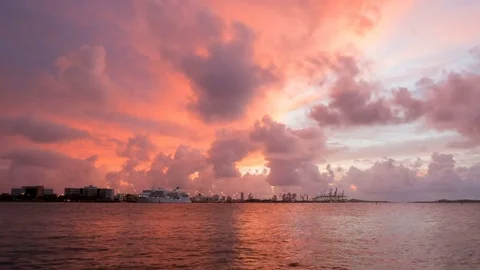 Time-lapse Of Miami Loading Cranes By Ocean With Ominous Clouds and Sunrise Video stock 82584550