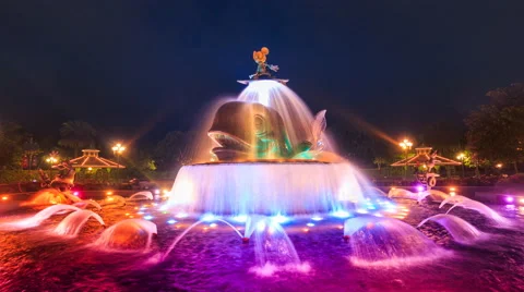Time Lapse Mickey Mouse Colorful Fountain Of Hong Kong Disneyland (loop play) Stock Footage 64660499