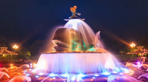 Time Lapse Mickey Mouse Colorful Fountain Of Hong Kong Disneyland (zoom out) Stock Footage 64660850