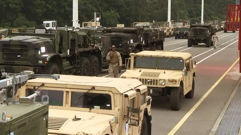 Time lapse of military vehicles assembling on bridge Stock Footage 109575230