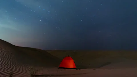 Time lapse milky way motion across night sky during off road camping in desert Stock Footage 269815842