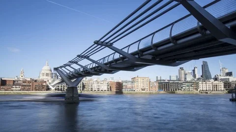 Time lapse of the Millennium Bridge and the City of London Stock Footage 82903972