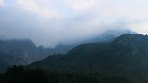 Time lapse misty cloud, fog on top of Austria Alps mountain after  rain Video stock 138111587