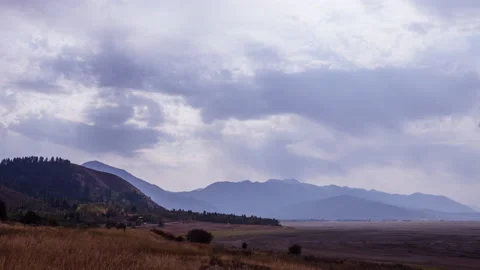 Time Lapse - Misty mountain landscape view with sun rays in autumn Stock Footage 155267849