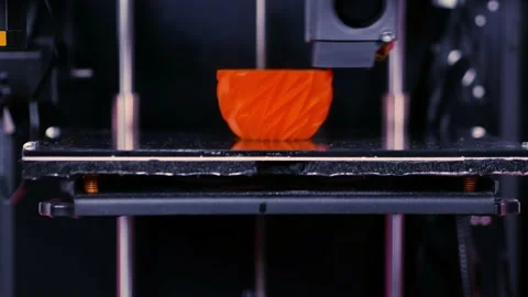 Time lapse modern 3D printer printing a prototype. Three dimensional printer Stock Footage 153373703