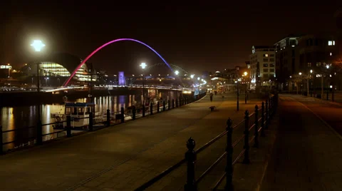 Time lapse of modern city millenium bridge newcastle gatehead city at night Stock Footage 39644401