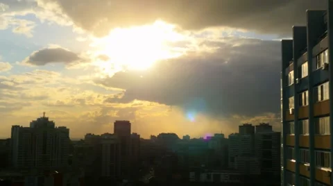 Time lapse of Modern cityscape skyscraper in cloudy weather during sunset Stock Footage 58865932