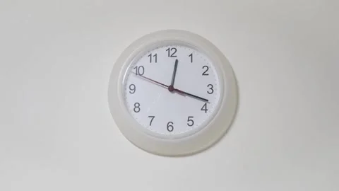 Time lapse on a modern wall watch white clock go forward. clocks shows time.. Stock Footage 272760818