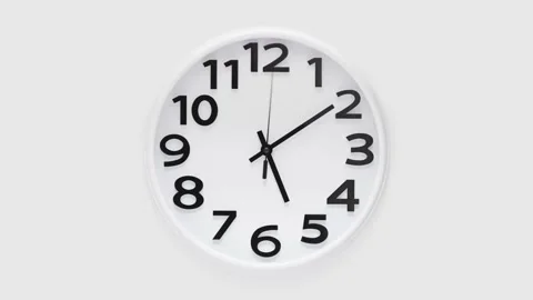 Time lapse on a modern wall watch white clock go forward. clocks shows time.. Stock Footage 272760826