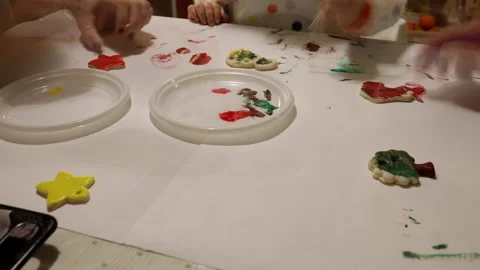 Time lapse: mom, dad, and child paints with acrilyc, home activities Stock Footage 142358154