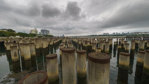 Time Lapse of Monsoon Cloud Moving Over Abandoned Construction Site. 스톡 동영상 106357006