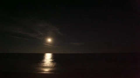 Time Lapse Moon above Ocean Stock Footage 11987555