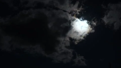 Time lapse of moon moves across the cloudy sky at night Stock Footage 307673319