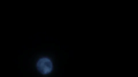 Time lapse - The moon moves in the dark and cloudy sky Stock Footage 115923011