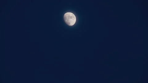 Time lapse of moon at night with a copy space. Half moon with detail surface. Stock Footage 218343629