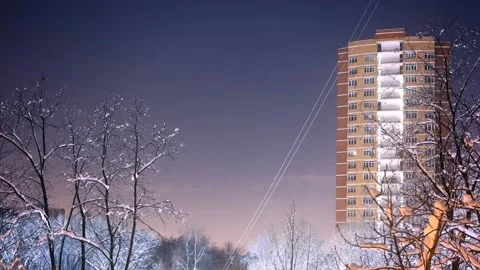 Time Lapse of moon rise behind a trees and the building Stock Footage 85616481
