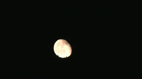 Time Lapse Moon Rising through the Sky Stock Footage 859826