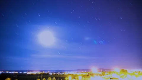 Time lapse moon in urban trails Stock Footage 130053870