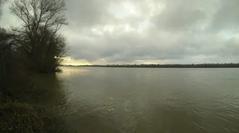 Time lapse mooving clouds are on the winter river. Stock Footage 55284409