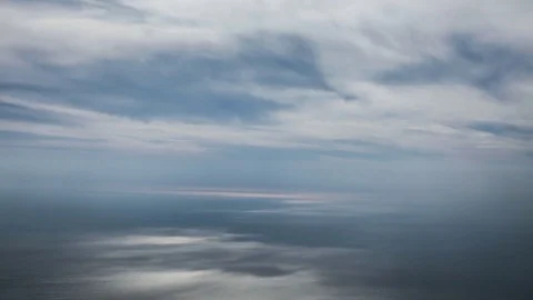 Time lapse Morning clouds over the sea Stockbeeldmateriaal 83795963