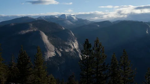 Time lapse of morning sunlight casting shadows at Glacier View Point in Yosemite Stock Footage 148179918
