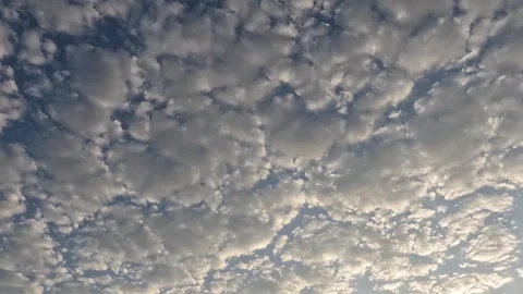 Time Lapse Motion Background - White Clouds Flying On Blue Sky with Sun Rays Video stock 247679126