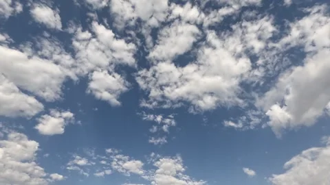 Time Lapse Motion Background - White Clouds Flying On Blue Sky with Sun Rays Stock Footage 247679242