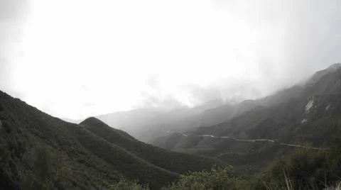 Time lapse motion fast storm clouds clearing over the Santa Ynez Mountains Stock Footage 1019551