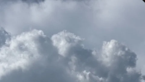 Time lapse, Motion movement with white fluffy clouds on blue sky. Stock Footage 95751480