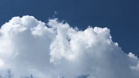 Time lapse, Motion movement with white fluffy clouds on blue sky. Stock Footage 95751616
