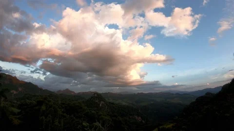 Time lapse motion The reflection of the Sun and the clouds move fast on sky Stock Footage 130567331