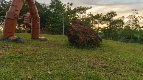 Time lapse on motion slider in front of robotic iron statue by unknown artist Stock-Footage 97740998