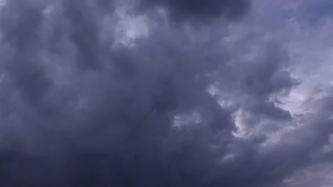 Time lapse, motion storm clouds against ... | Stock Video | Pond5
